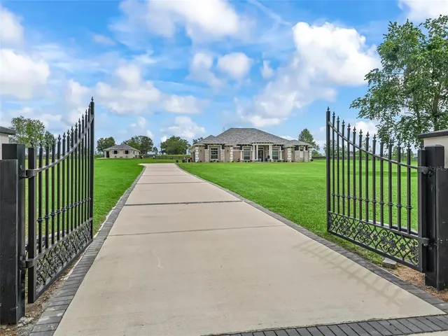 a view of a chairs and tables in patio