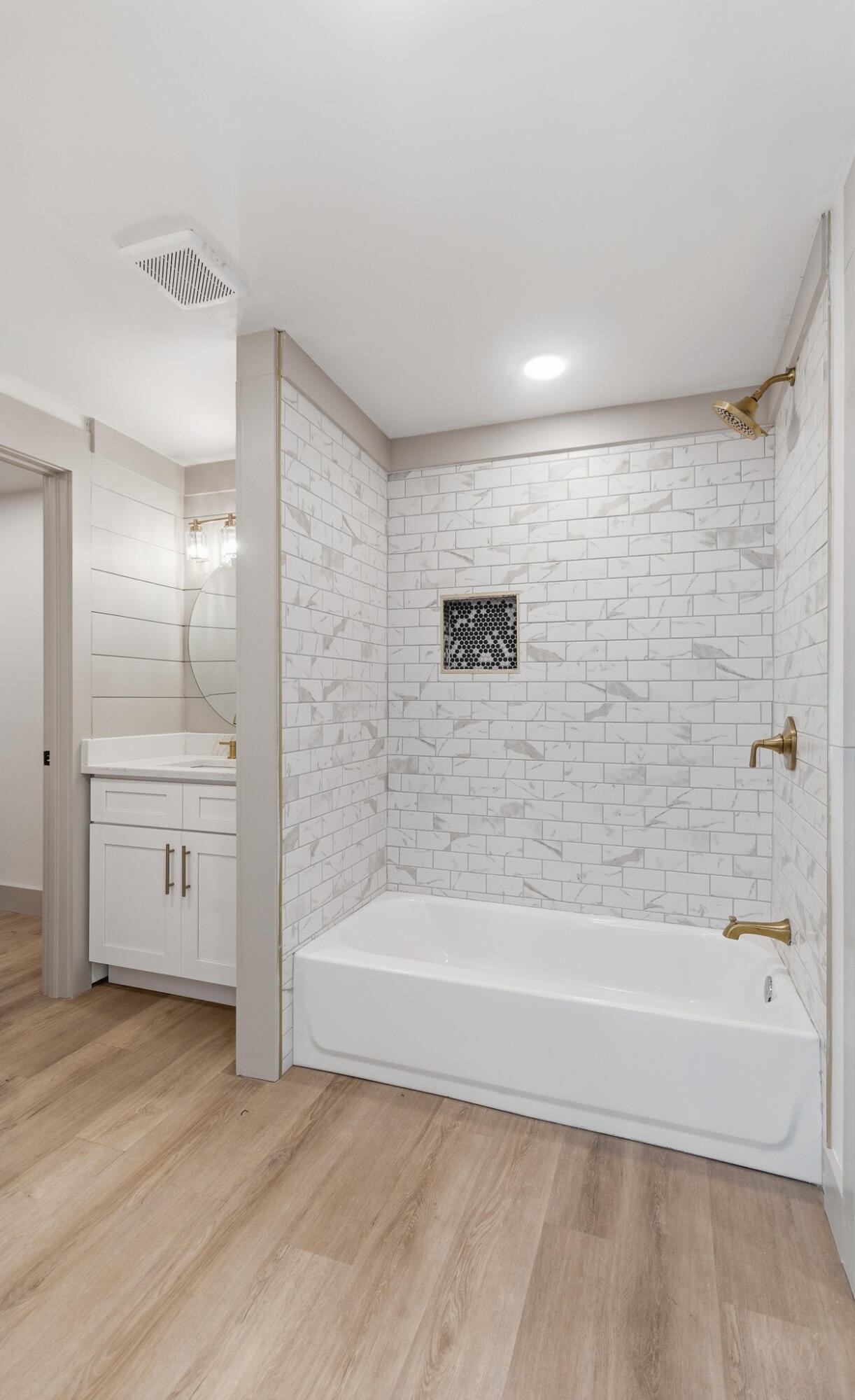 2317 Howell Street Cleveland, TN 37323 - Photo 27 of 39 a bathroom with a bathtub and a shower