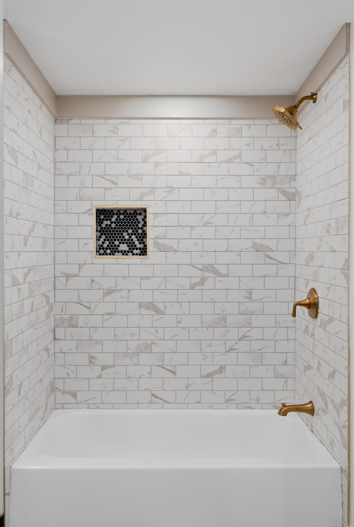 2317 Howell Street Cleveland, TN 37323 - Photo 31 of 39 a bathroom with a bathtub and a shower