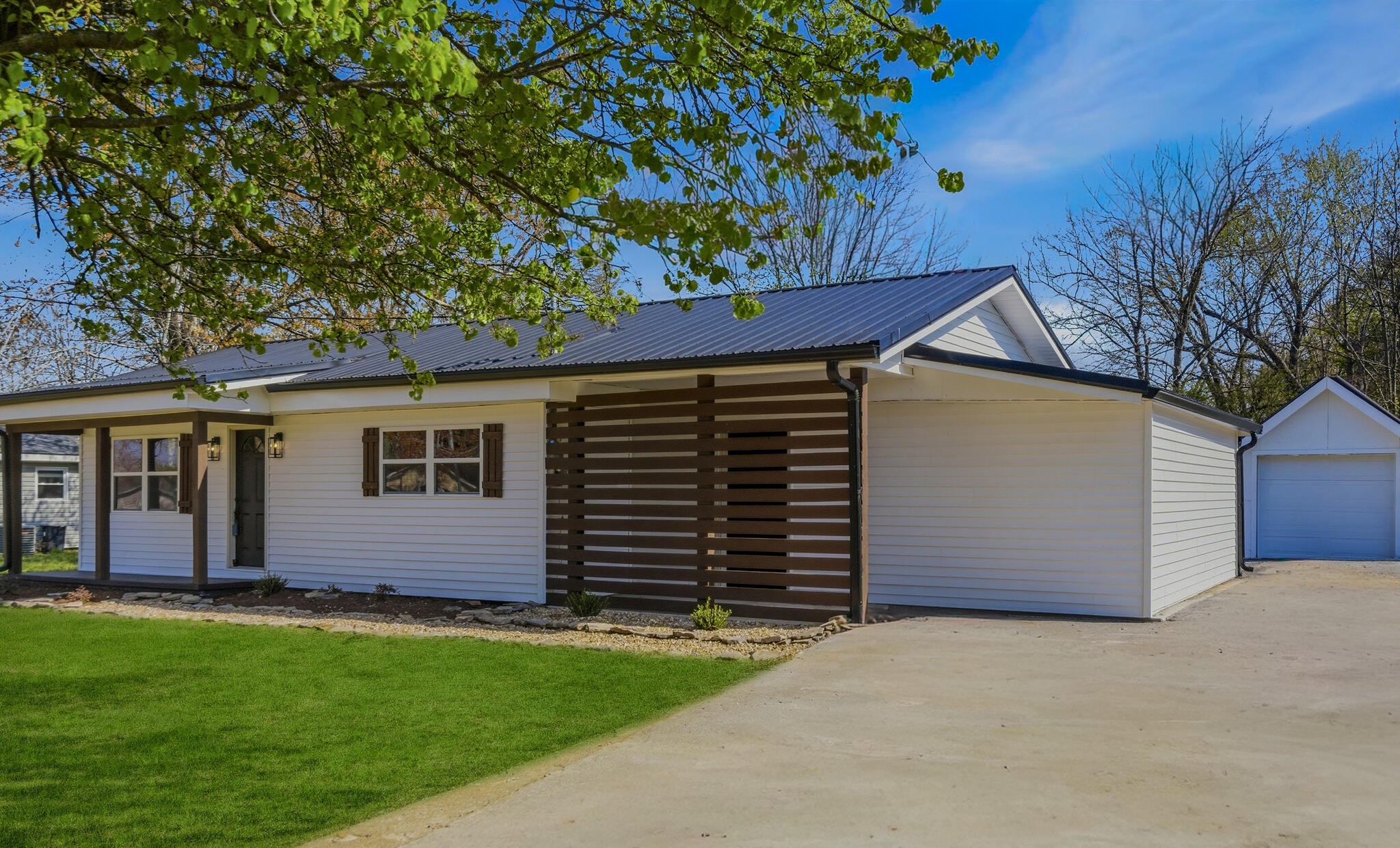 2317 Howell Street Cleveland, TN 37323 - Photo 39 of 39 a front view of house with yard and trees in the background