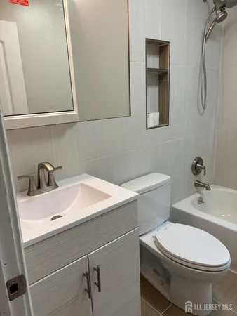 a bathroom with a sink and a toilet