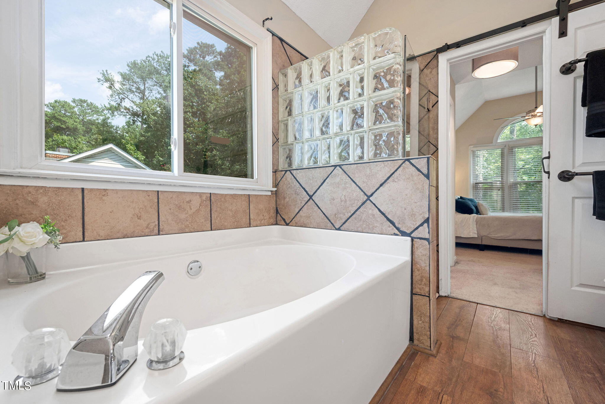 4400 Emmit Drive Raleigh, NC 27604 - Photo 19 of 38 a bath tub sitting next to a window