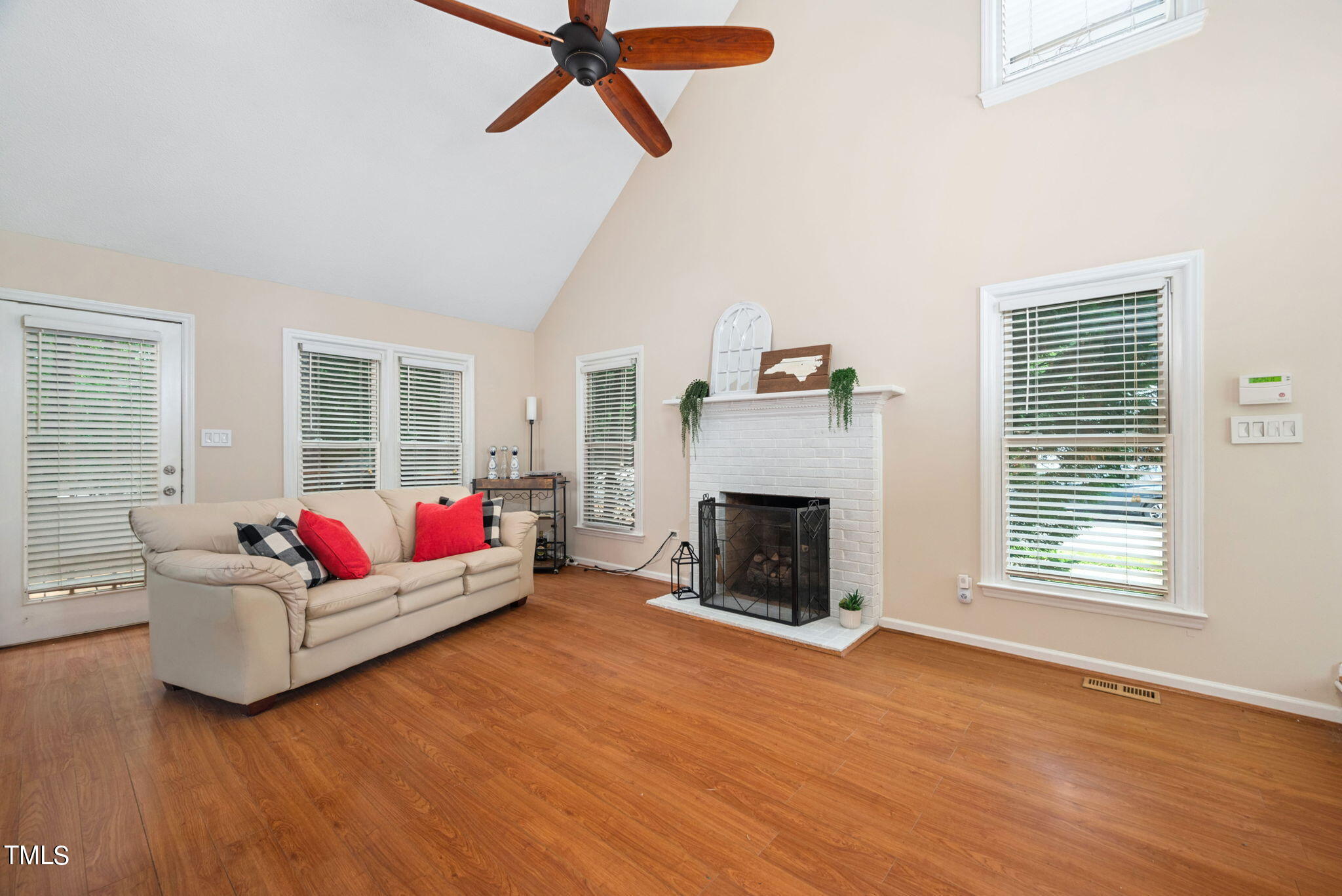 4400 Emmit Drive Raleigh, NC 27604 - Photo 5 of 38 a living room with furniture and a fireplace