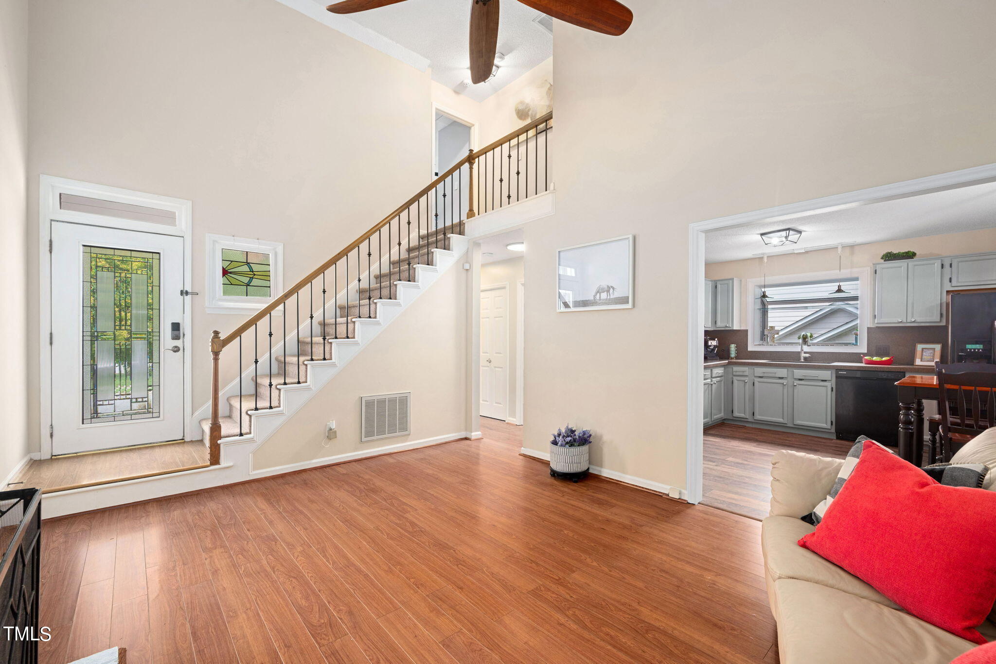 4400 Emmit Drive Raleigh, NC 27604 - Photo 6 of 38 a view of kitchen and dining room with wooden floor