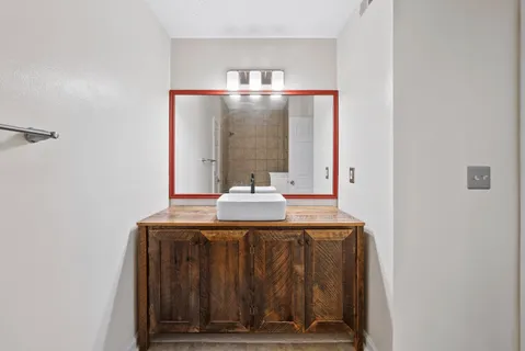 a bathroom with a bathtub and toilet