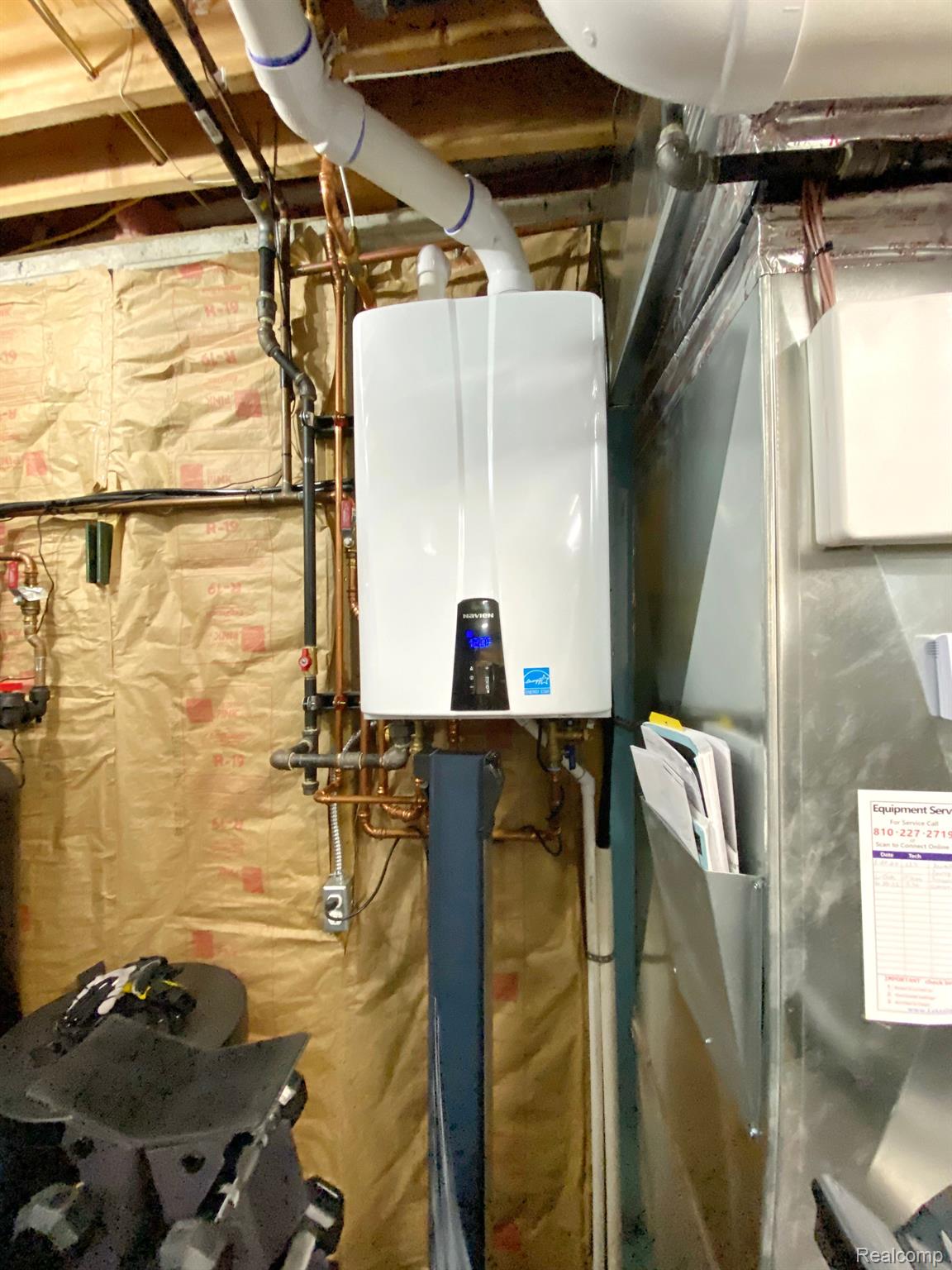 4435 Lily Drive Howell, MI 48843 - Photo 43 of 58 NEW Tankless Hot Water Heater