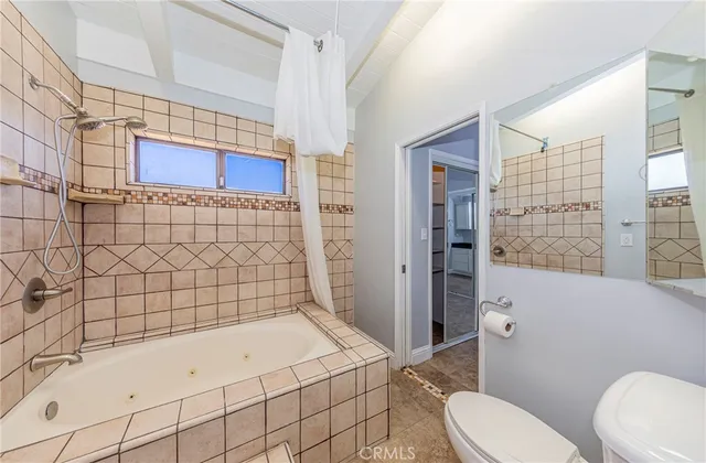 a view of a hallway with windows