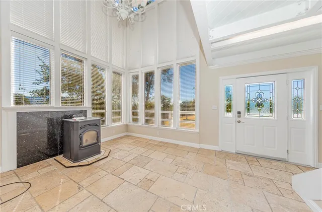 a view of an entryway with a chandelier