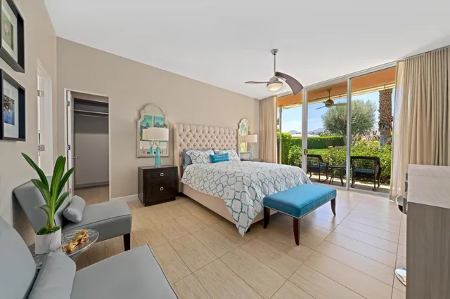 a bathroom with a tub shower and sink
