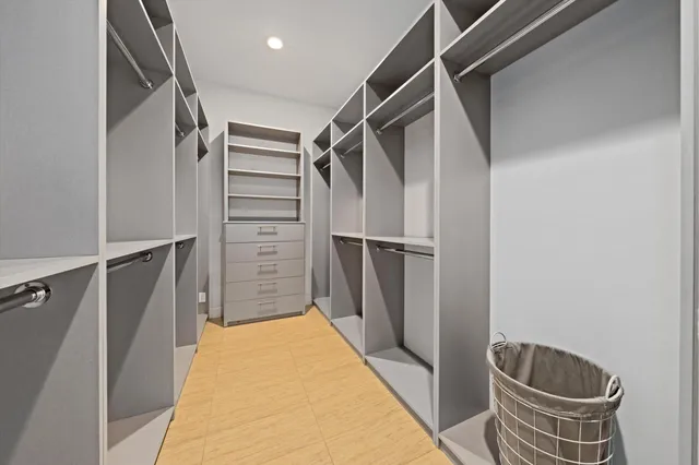 a view of a sink and a washer in a utility room