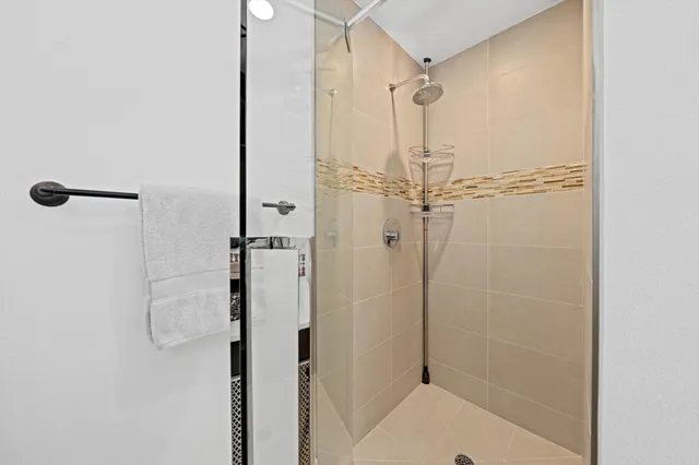 a bathroom with a sink and mirror