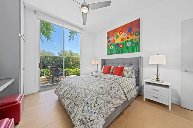 a view of a patio with couches chairs and a fire pit