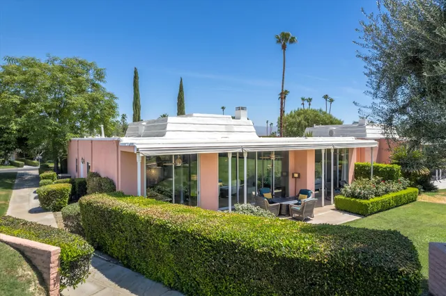 a house with trees in front of it