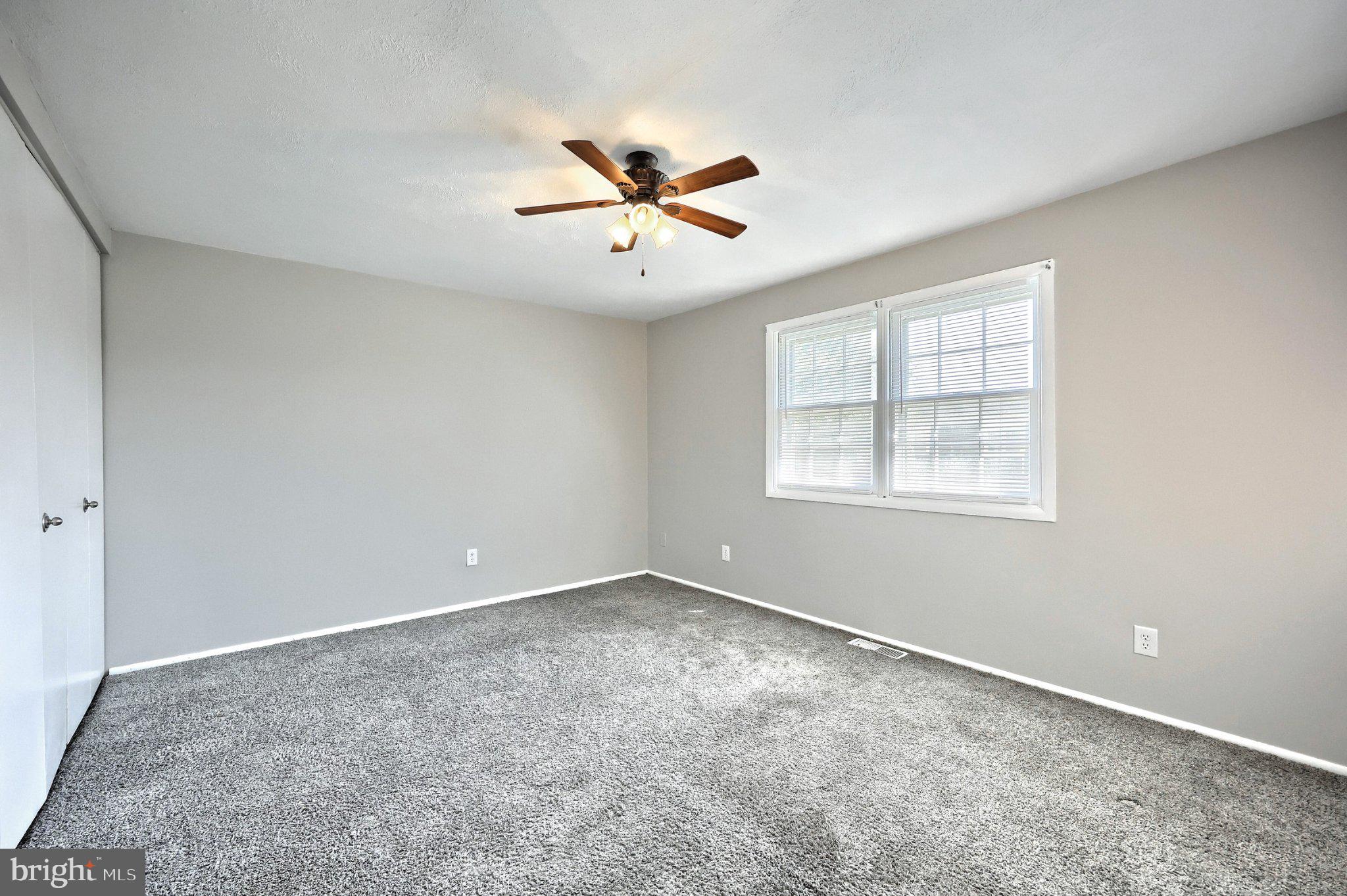 1714 Devers Road York, PA 17404 - Photo 20 of 26 an empty room with windows and fan