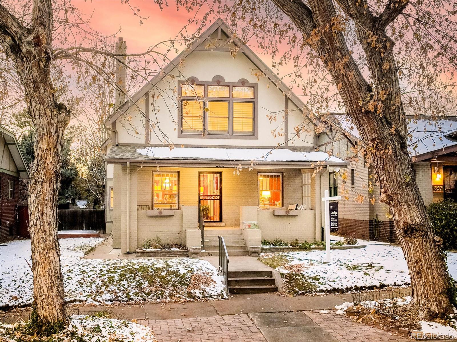 655 Gilpin Street Denver, CO 80218 - Photo 2 of 29 a front view of a house with a natural light
