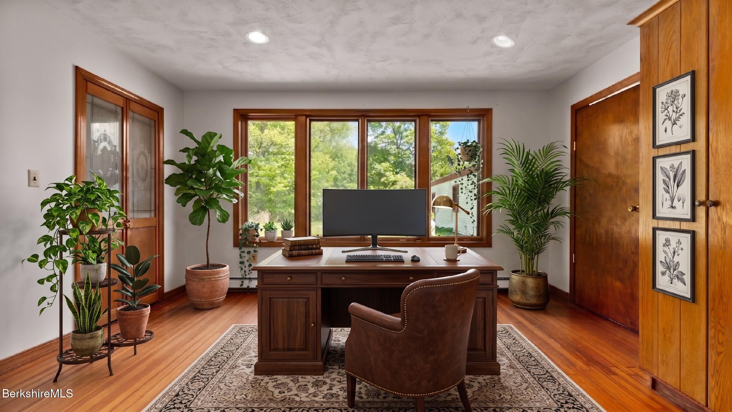 20 East Dugway Road Lenox, MA 01240 - Photo 23 of 84 a view of a workspace with furniture and a potted plant