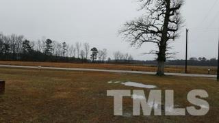 4094 Maxwell Road Autryville, NC 28318 - Photo 5 of 8 a view of swimming pool next to a yard