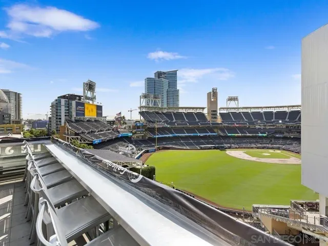 a outdoor living space with patio furniture and a potted plant