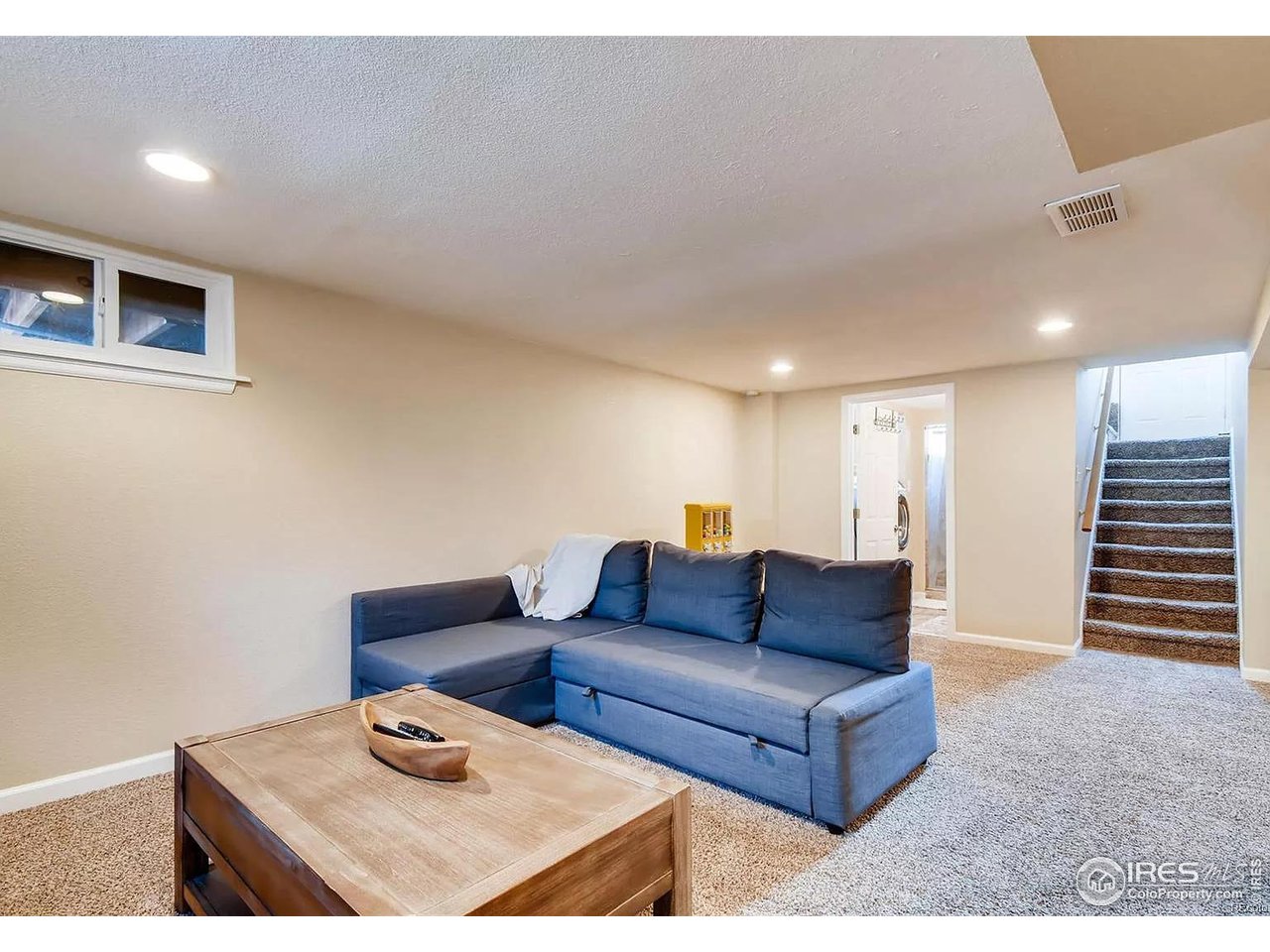 4870 Irving Street Denver, CO 80221 - Photo 11 of 19 a living room with furniture