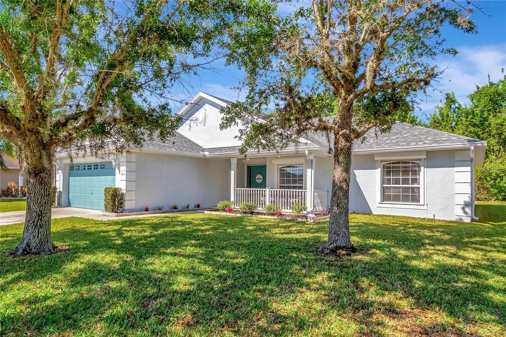 3610 Doe Run Drive St. Cloud, FL 34772 - Photo 1 of 1 front view of a house with a yard