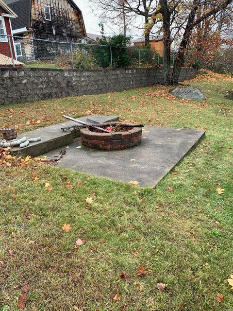 29 Somerset Street Millinocket, ME 04462 - Photo 37 of 38 fire pit in backyard
