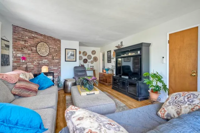 a living room with furniture and a couch