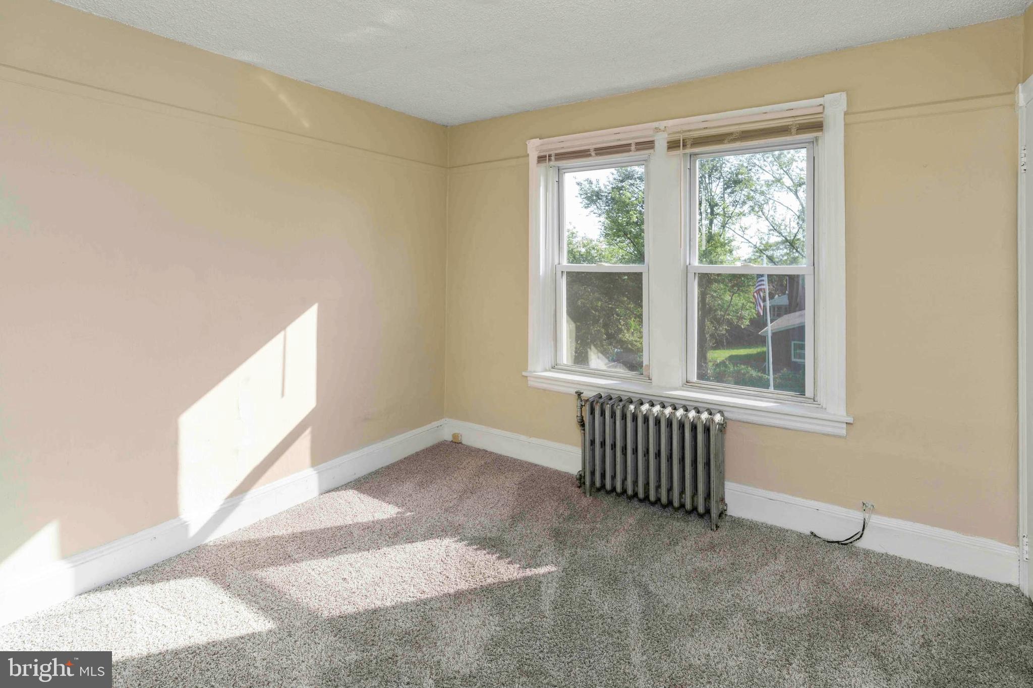 132 West Ridge Road Marcus Hook, PA 19061 - Photo 20 of 26 a view of an empty room with a window