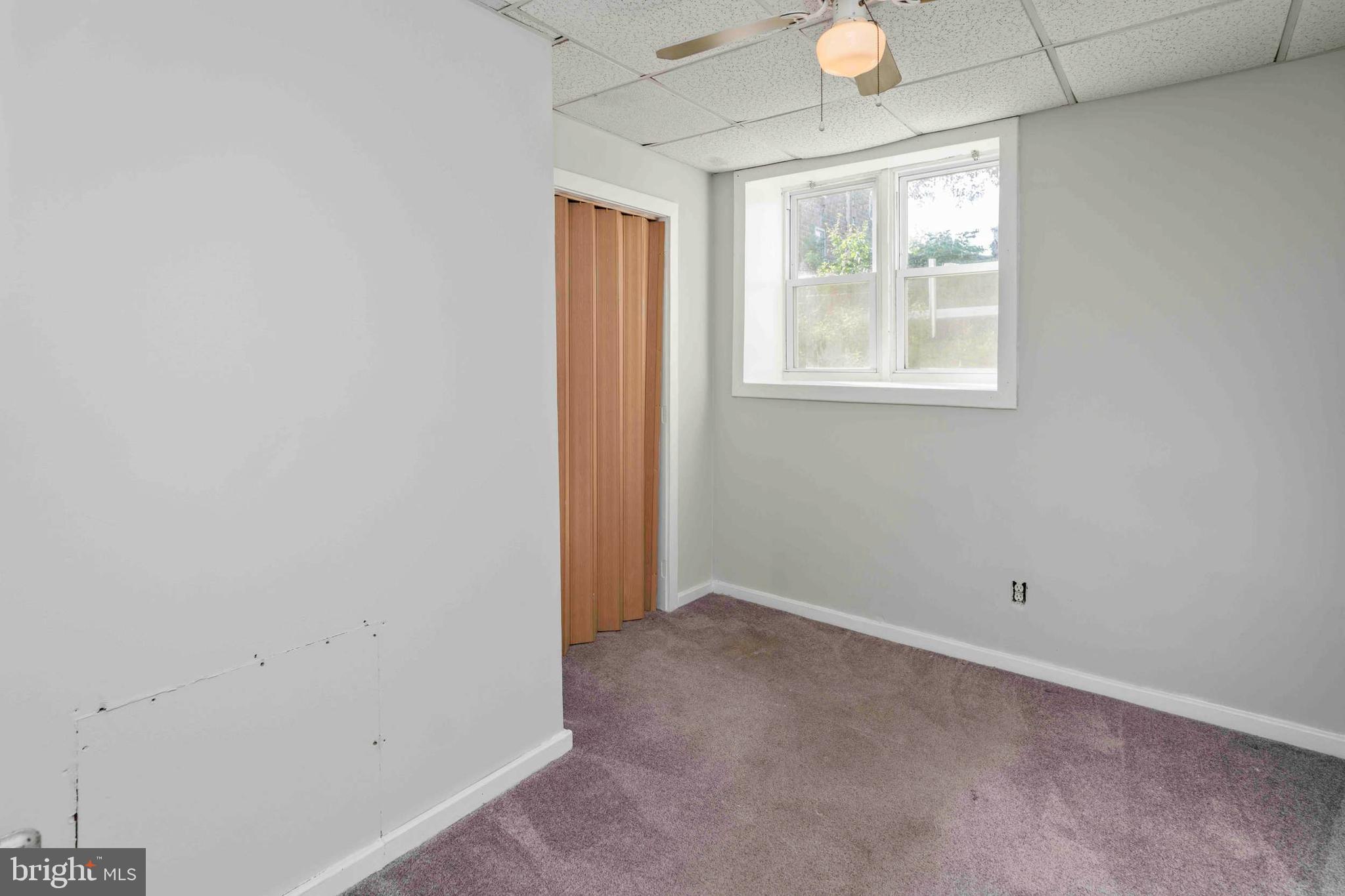 132 West Ridge Road Marcus Hook, PA 19061 - Photo 8 of 26 a view of an empty room with a window
