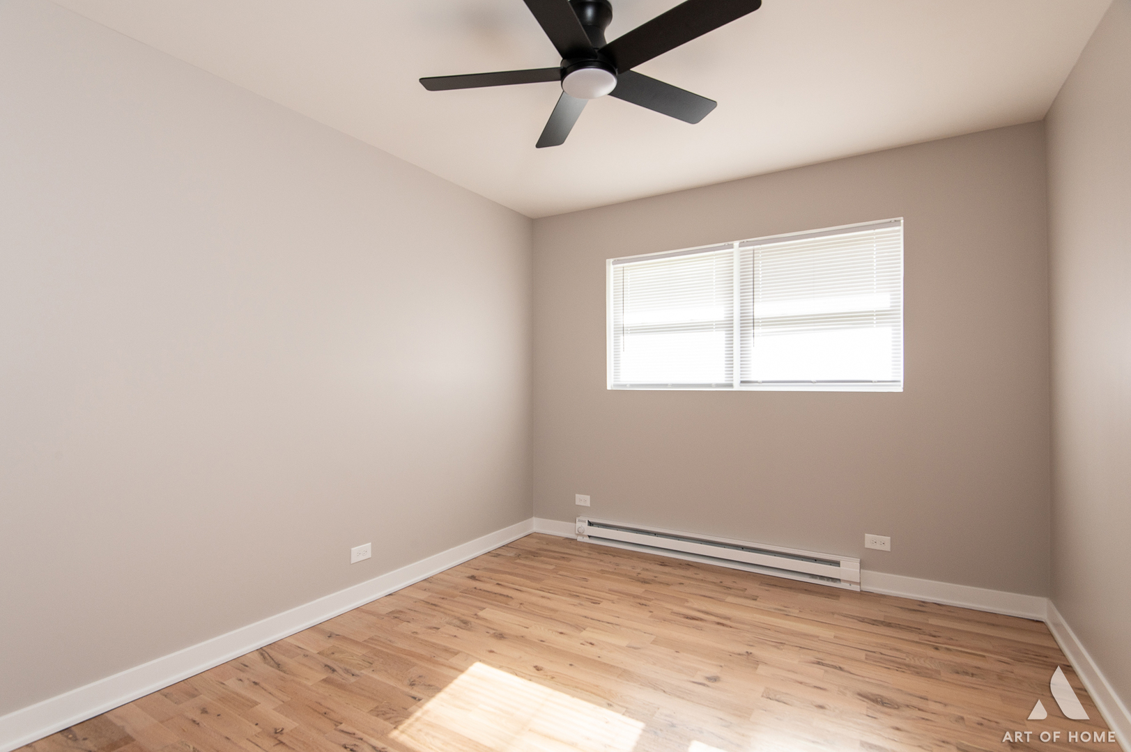 14924 Indiana Avenue Dolton, IL 60419 - Photo 13 of 73 an empty room with a window and a ceiling fan