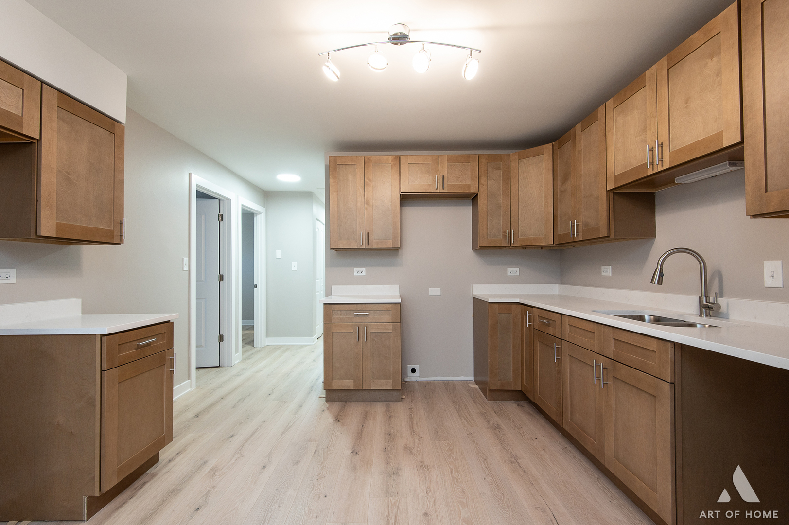 14924 Indiana Avenue Dolton, IL 60419 - Photo 40 of 73 a kitchen with a sink cabinets and wooden floor