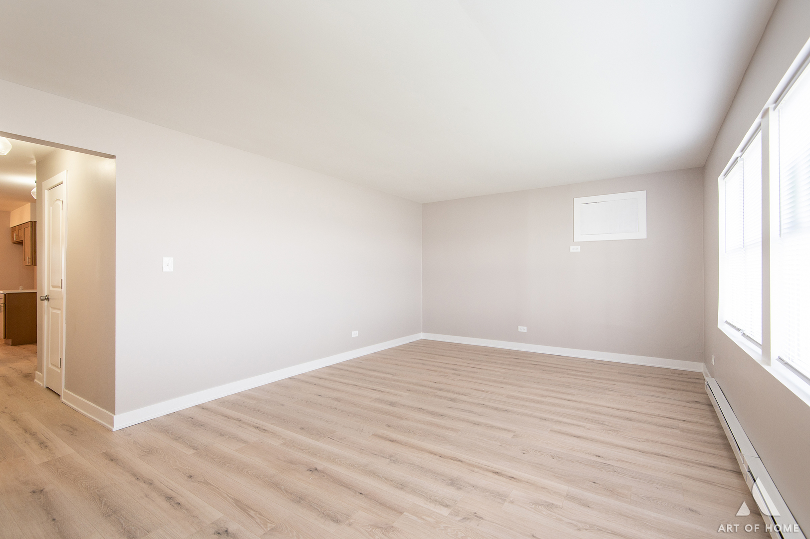 14924 Indiana Avenue Dolton, IL 60419 - Photo 46 of 73 an empty room with wooden floor and windows