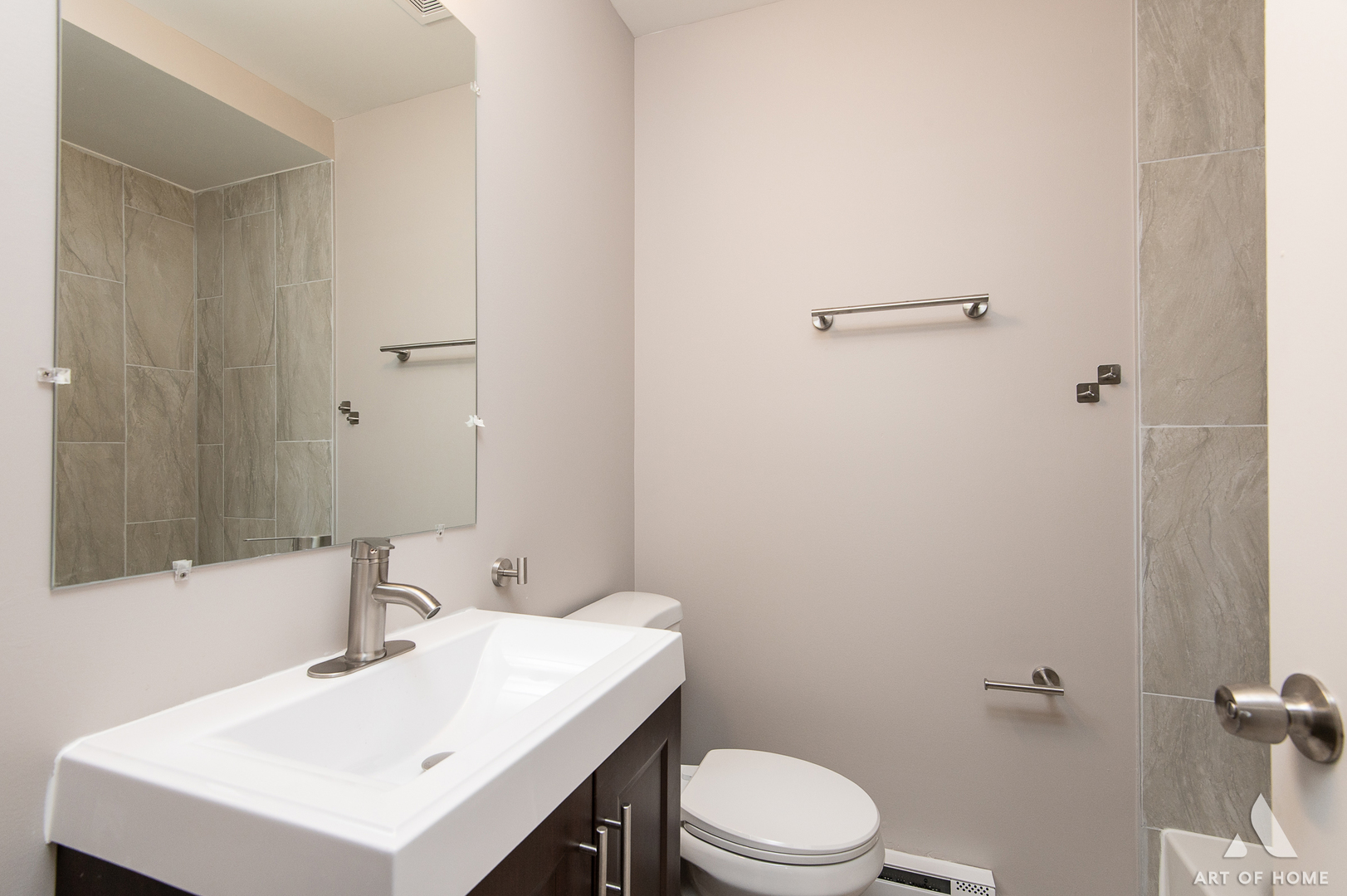 14924 Indiana Avenue Dolton, IL 60419 - Photo 48 of 73 a bathroom with a sink a toilet and mirror