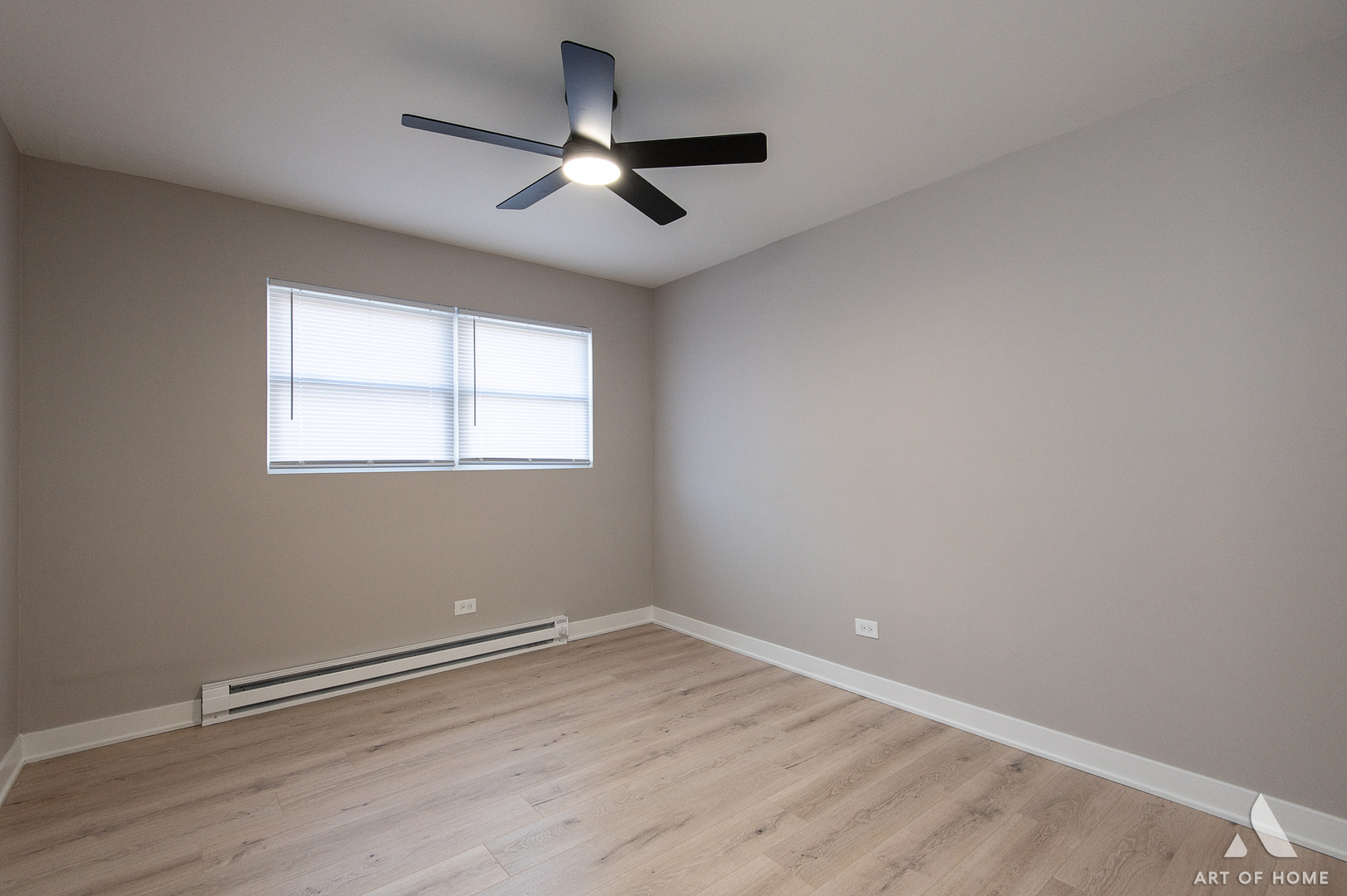 14924 Indiana Avenue Dolton, IL 60419 - Photo 50 of 73 an empty room with wooden floor fan and windows