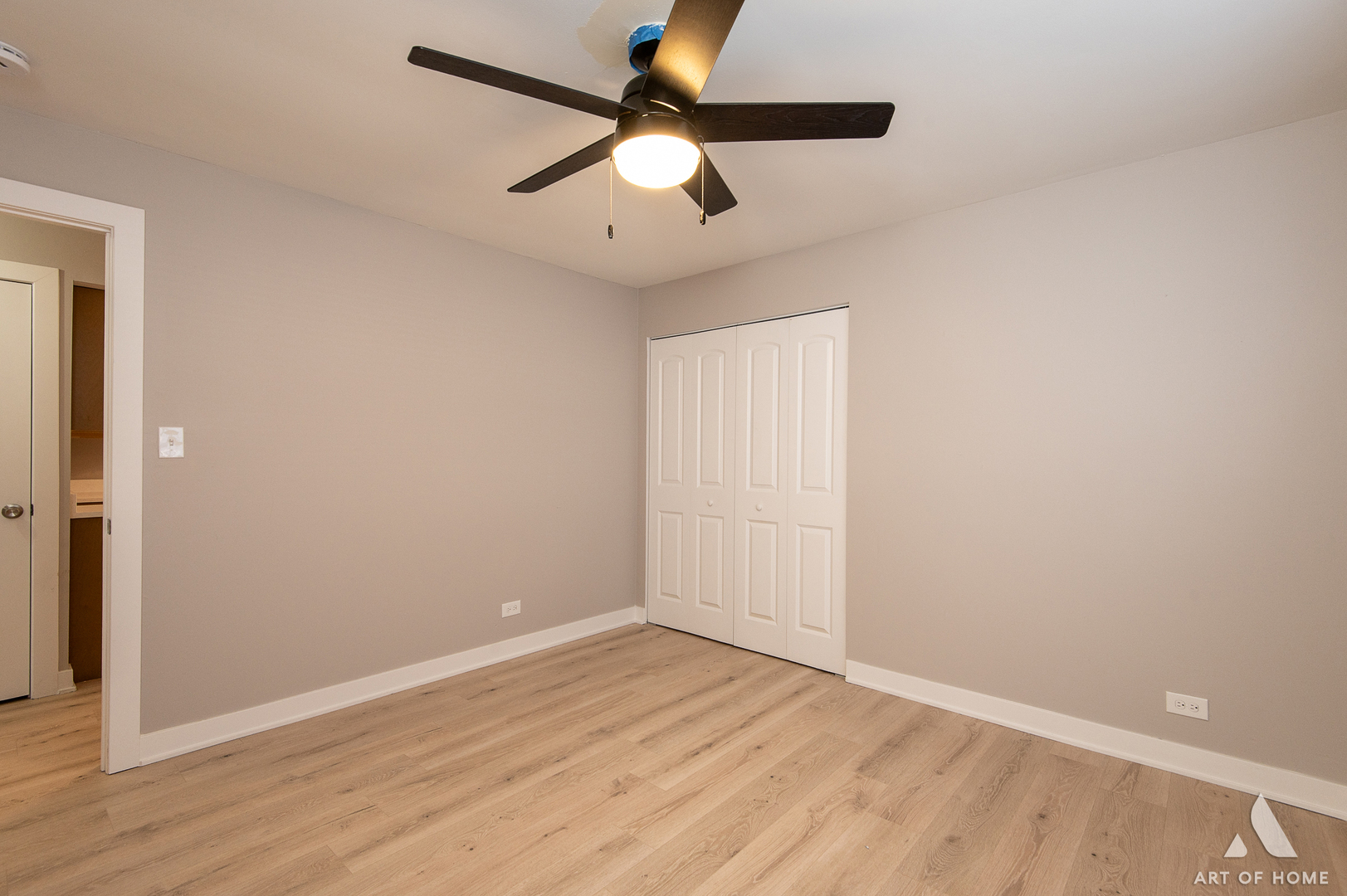 14924 Indiana Avenue Dolton, IL 60419 - Photo 53 of 73 an empty room with wooden floor ceiling fan and window