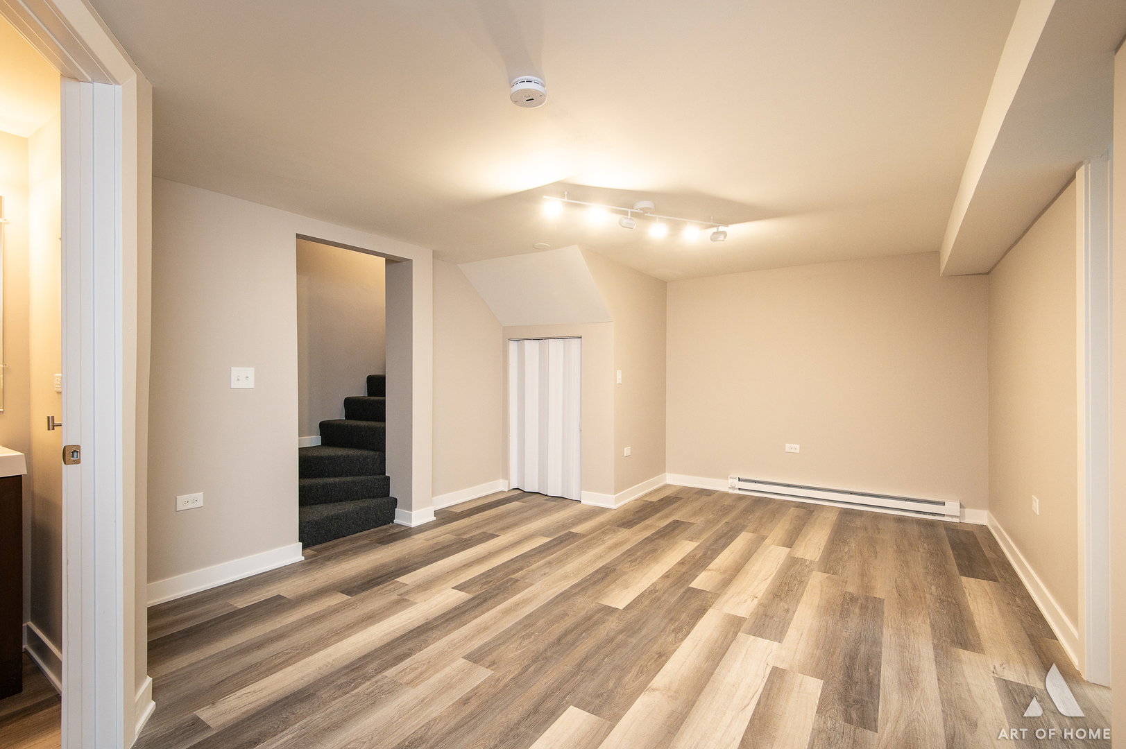 14924 Indiana Avenue Dolton, IL 60419 - Photo 65 of 73 a view of an empty room with wooden floor and a window