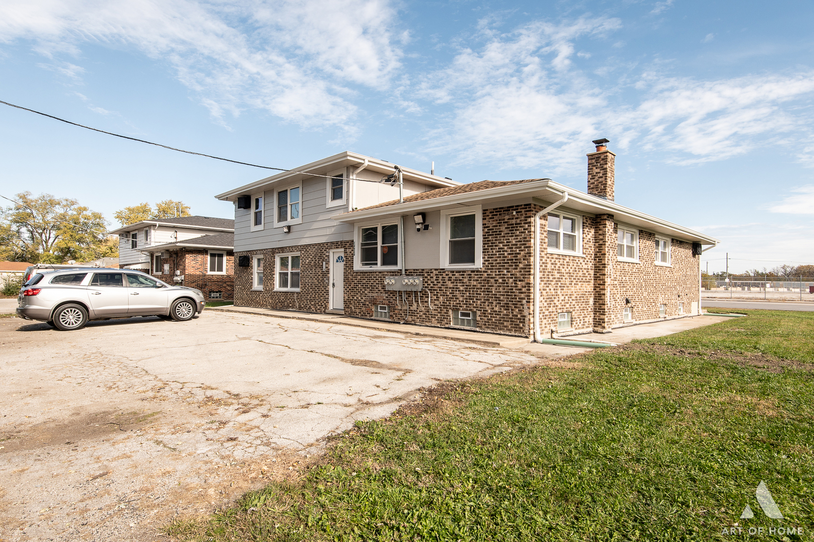 14924 Indiana Avenue Dolton, IL 60419 - Photo 7 of 73 a front view of a house with a yard
