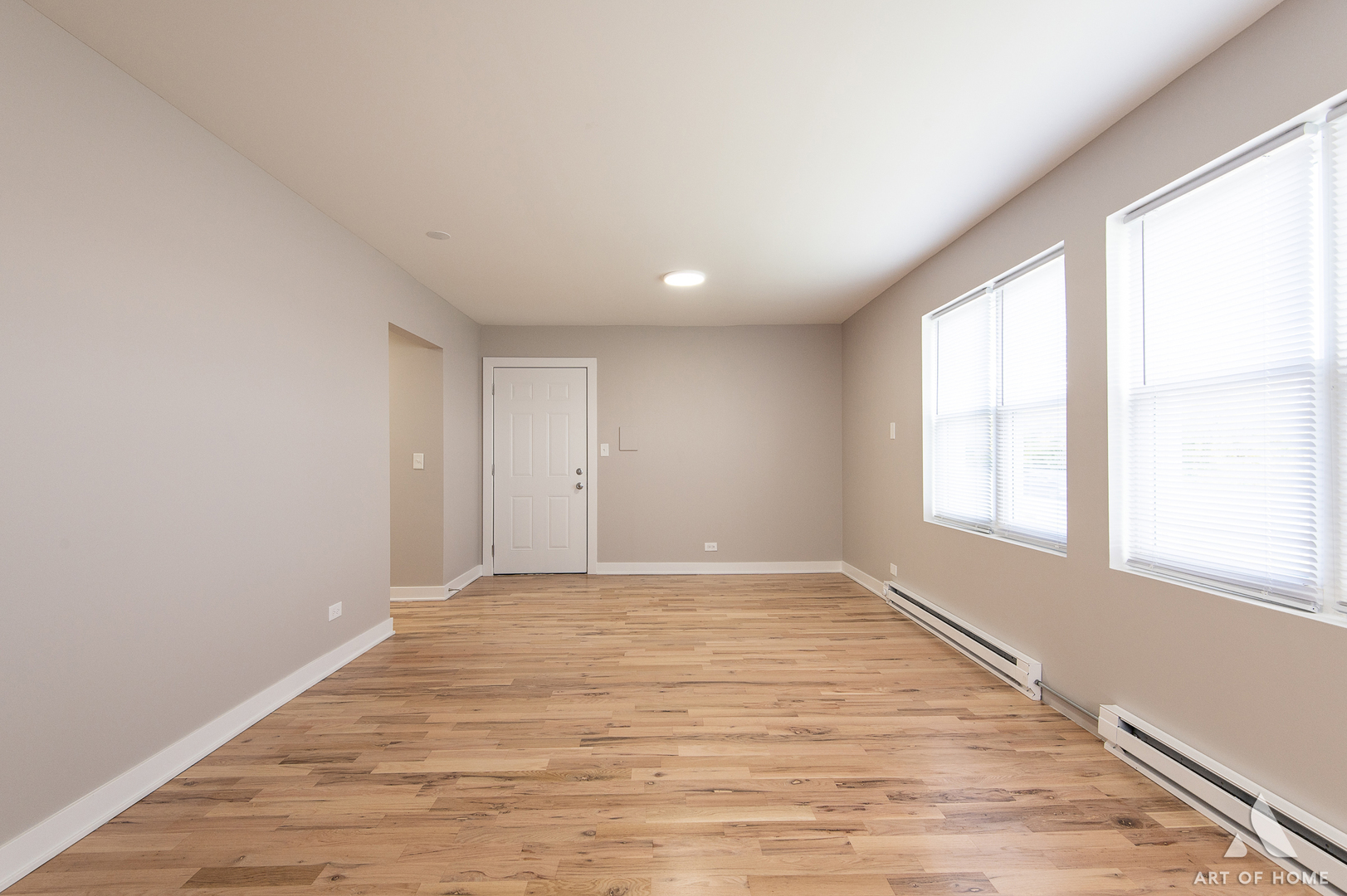 14924 Indiana Avenue Dolton, IL 60419 - Photo 10 of 73 an empty room with wooden floor and windows