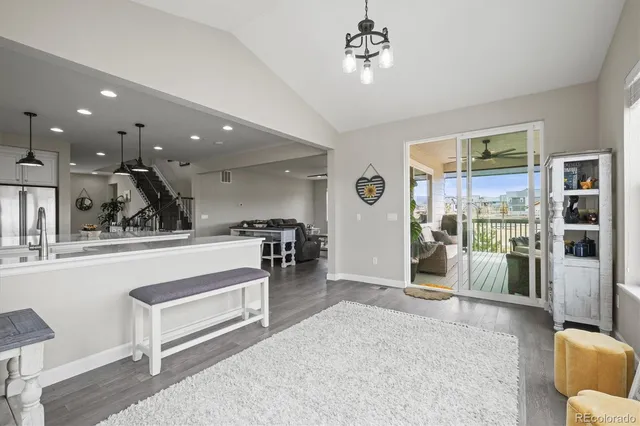 a bedroom with a bed and a table