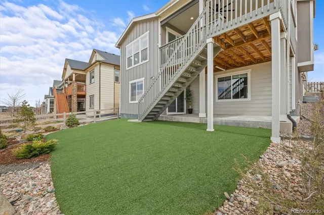a bedroom with a bed and a potted plant