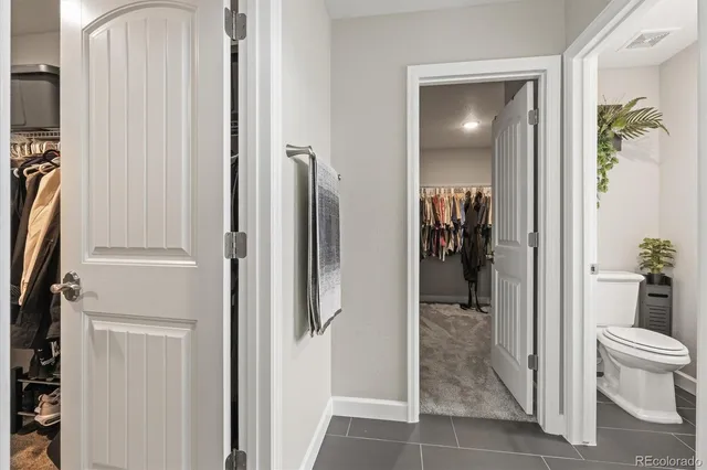 a view of a livingroom with furniture and windows