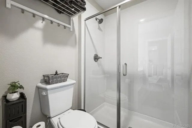 a room with furniture and pool table