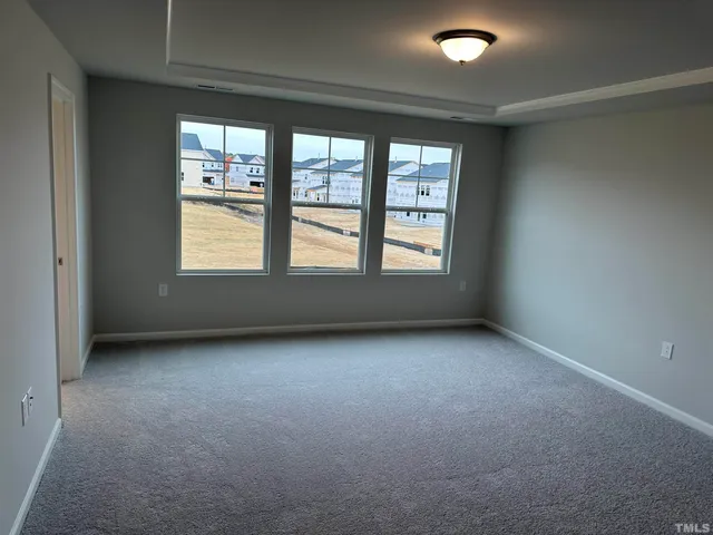 a bathroom with a double vanity sink and mirror