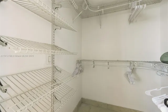 a view of a room with racks on the wall