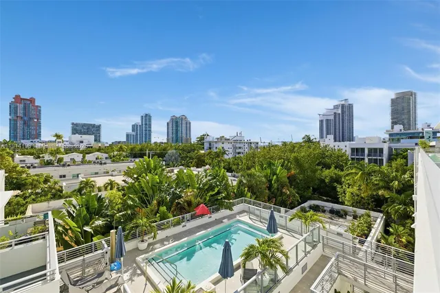 a view of yard with an outdoor seating