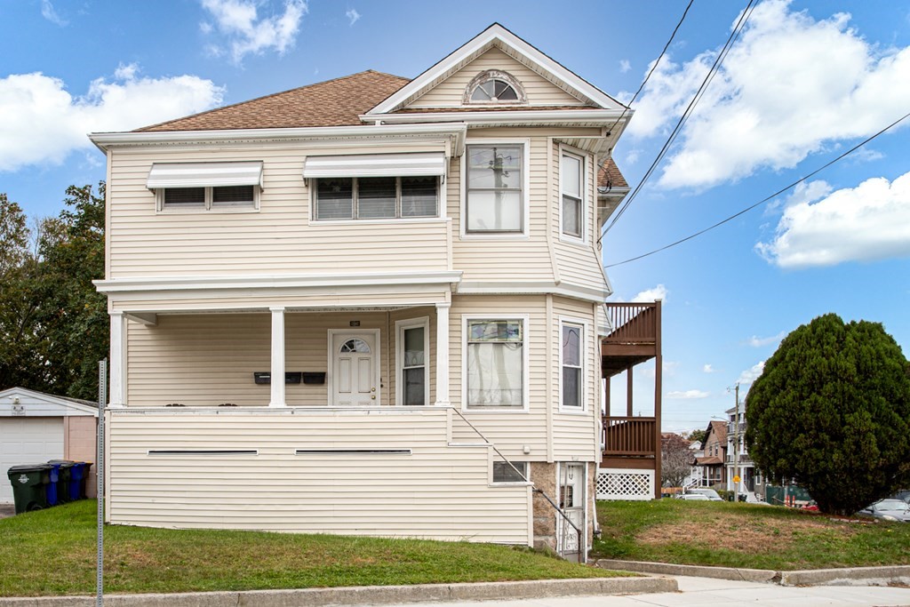 828-830 Stafford Road Fall River, MA 02721 - Photo 2 of 30 a front view of a house with a yard