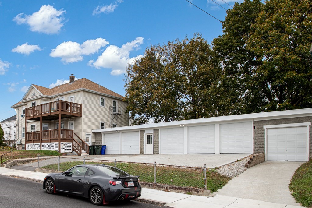 828-830 Stafford Road Fall River, MA 02721 - Photo 6 of 30 a front view of a house with a yard