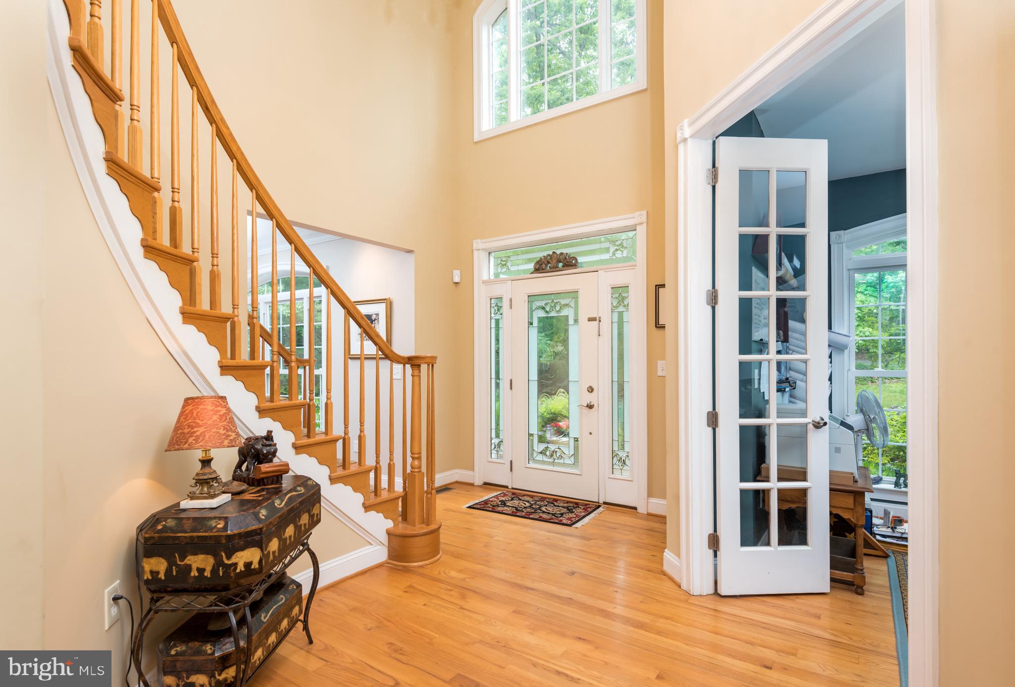 10149 Wesley Chapel Road Marshall, VA 20115 - Photo 15 of 39 ENTRY FOYER WITH CURVED STAIRCASE