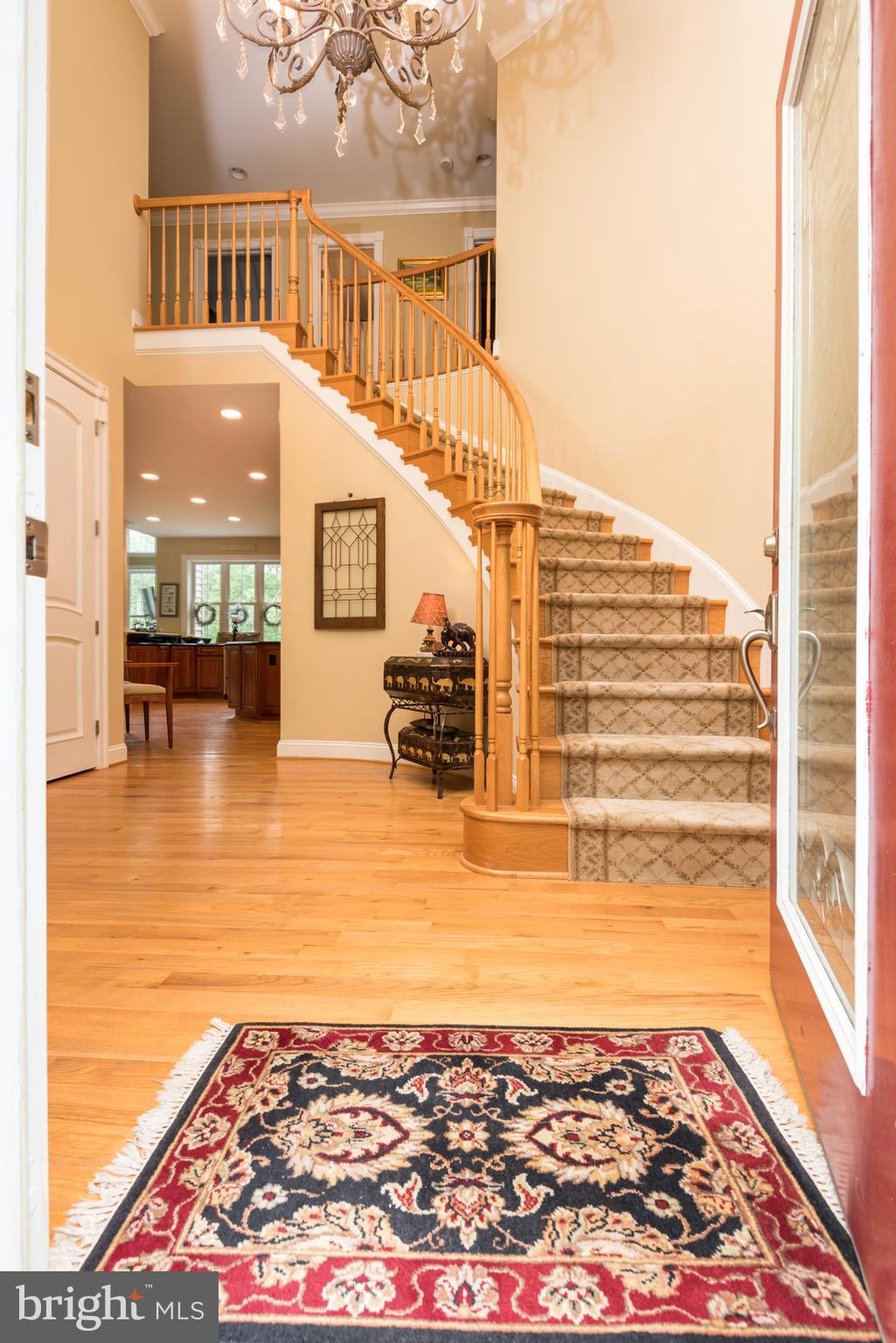 10149 Wesley Chapel Road Marshall, VA 20115 - Photo 16 of 39 FOYER WITH CURVED STAIRCASE