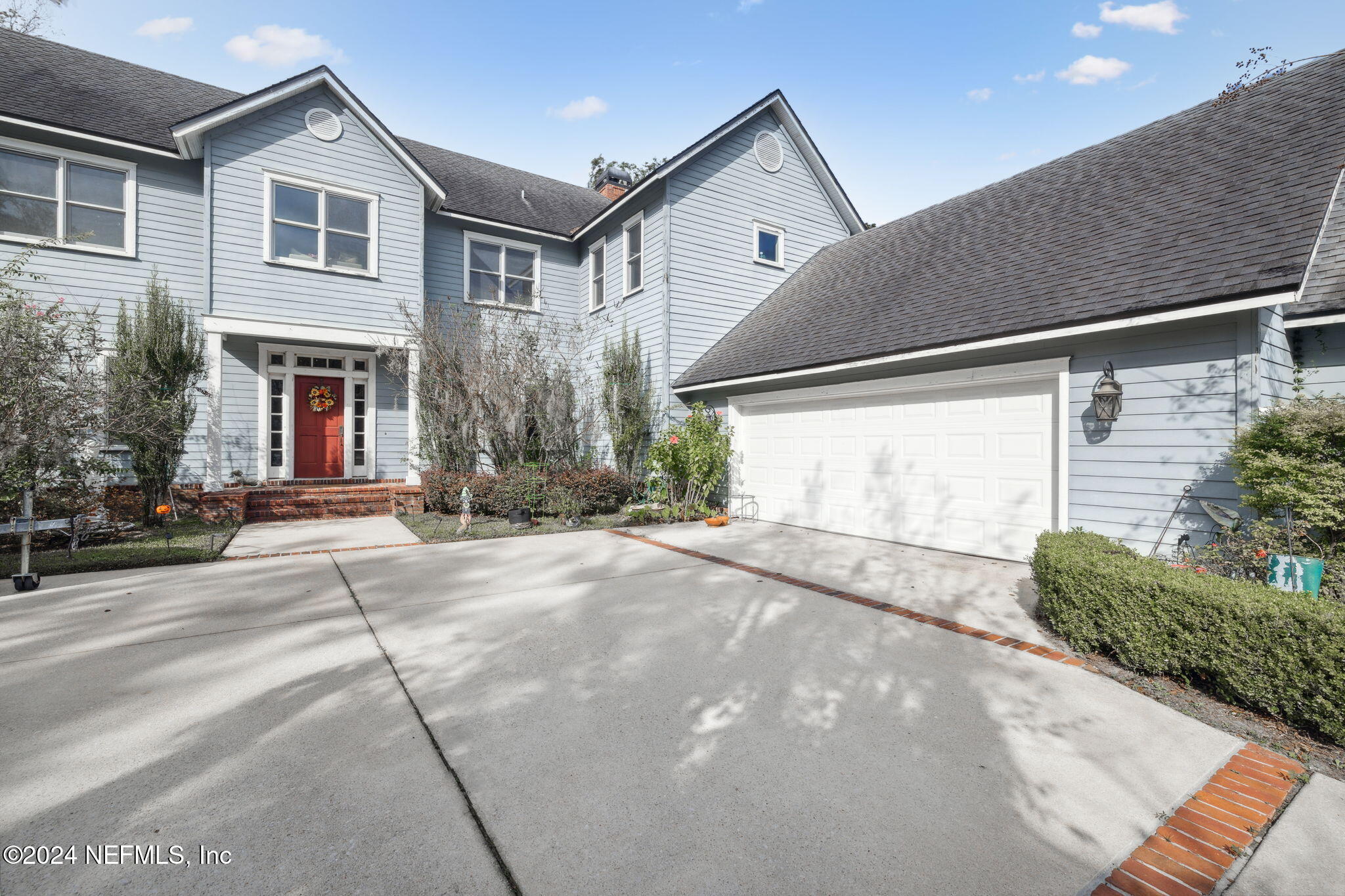 12668 Mandarin Road Jacksonville, FL 32223 - Photo 5 of 46 Front Drive and garage