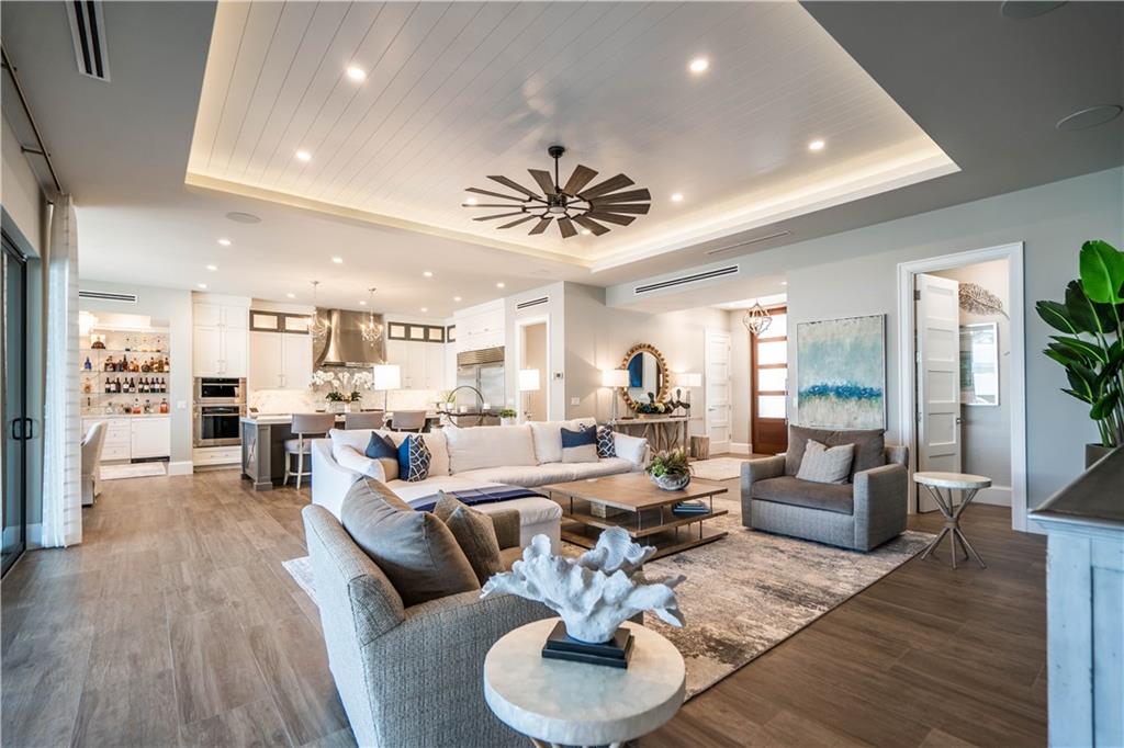 2349 Northeast 24th Street Lighthouse Point, FL 33064 - Photo 16 of 85 a living room with furniture or couch and a wooden floor